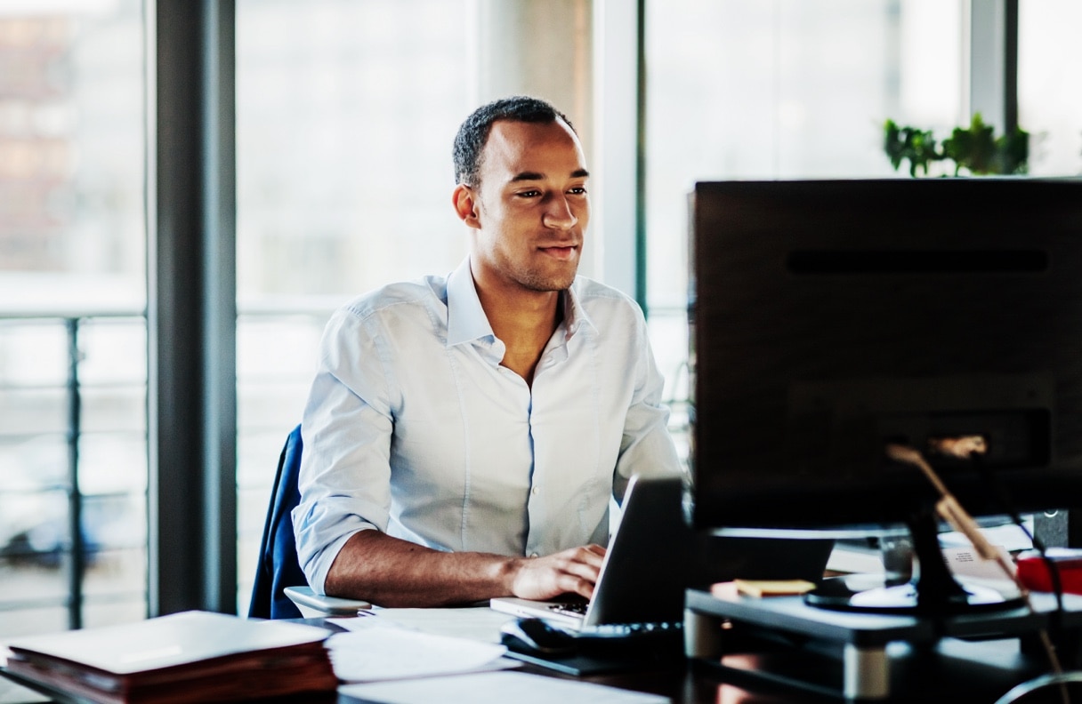 Investor browsing for mutual funds on his computer