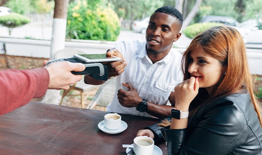 Person using their mobile wallet to pay