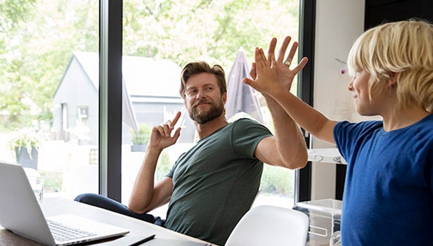 Father giving his son a high-five