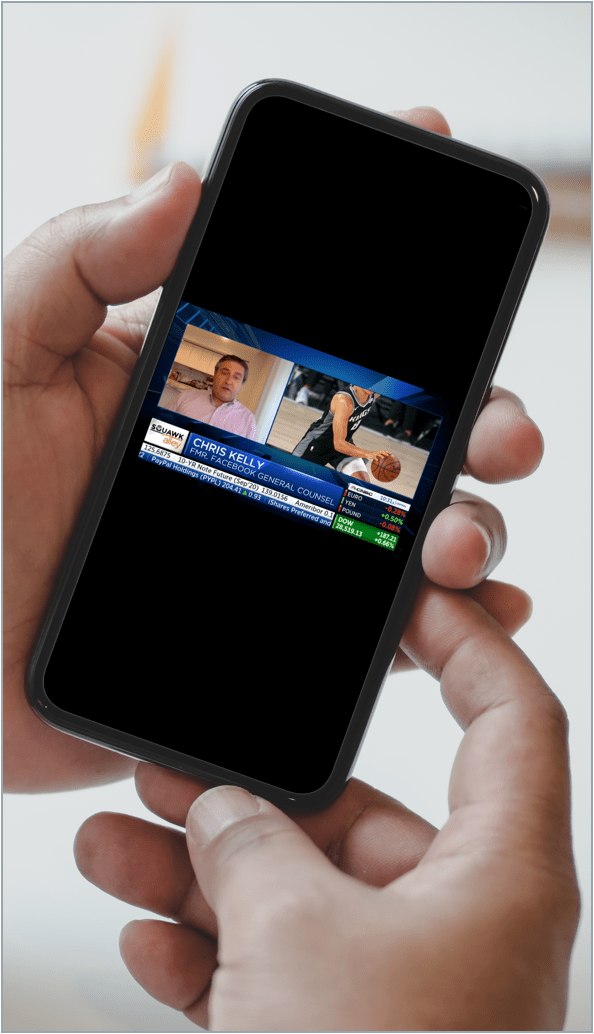 Investor looking at CNBC on cell phone